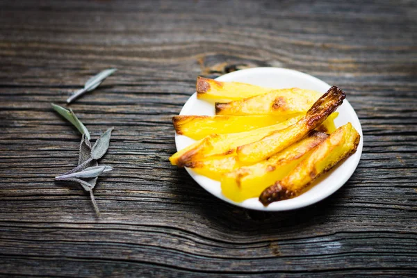 Papas Fritas Horno Sobre Fondo Madera Imagen de archivo