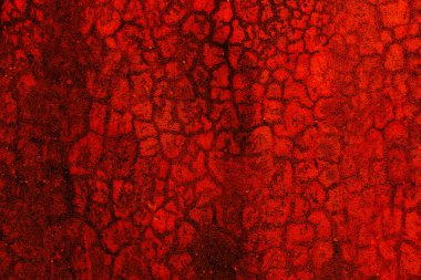 Abstract textured background in bright red