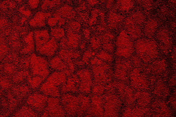Абстрактный текстурированный фон в красном
