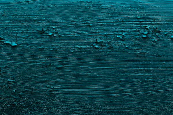 Abstract textured background in petrol