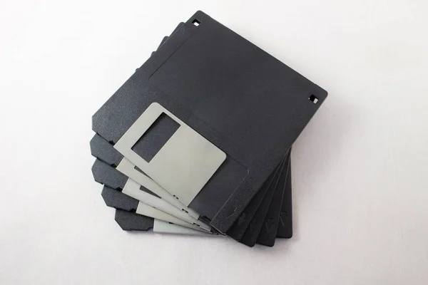 Top view of Floppy discs stacked on white background — 스톡 사진