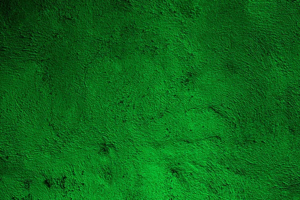 Green colored abstract wall background with textures of different shades of green