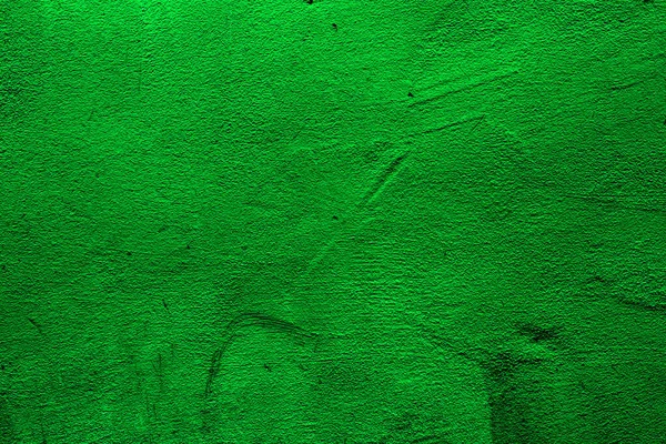 Green colored abstract wall background with textures of different shades of green