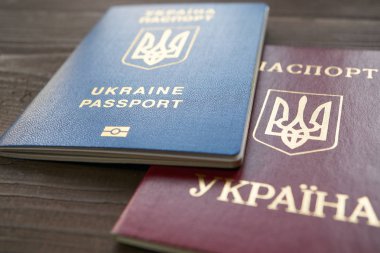 two versions of Ukrainian passport red and blue documents clipart