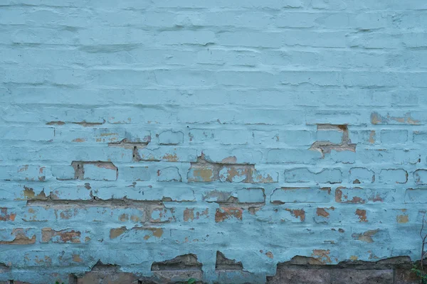 Téglafal, hámozott kék festék absztrakt háttér — Stock Fotó