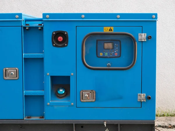 industrial diesel power generator electrical equipment. close-up of control panel with display and buttons.
