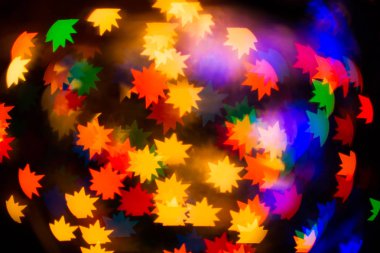 Şenlikli bir kaleydoskop, parlak bir ışık ve parlama. Bileşimi