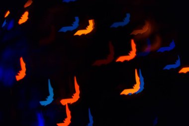 Yarasalar, çok renkli vurgular parlayan ve parlayan bir bulut 