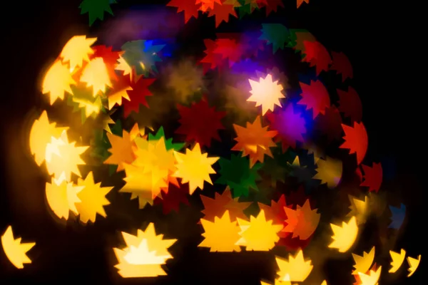 Um caleidoscópio festivo, uma luz brilhante e brilho. Composição de — Fotografia de Stock