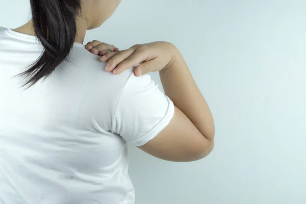 Woman handle the shoulder pain on white background. Health care — Stock Photo, Image