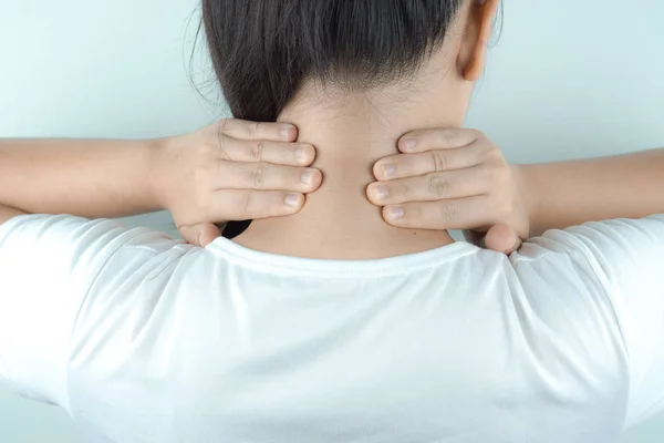 Closeup woman neck and shoulder feeling exhausted and suffering — Stock Photo, Image