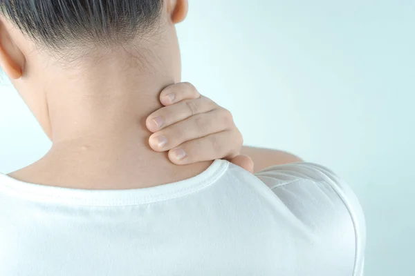 Closeup woman neck and shoulder feeling exhausted and suffering