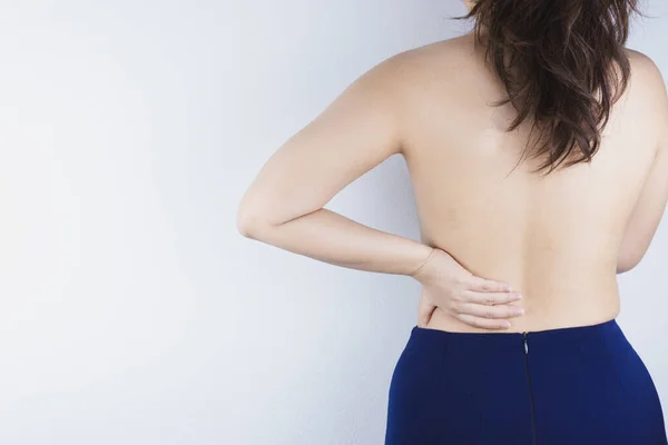 Closeup woman suffering from lower back pain. Health care and me — Stock Photo, Image