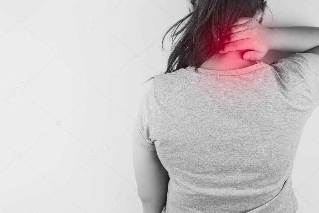 Black and white closeup woman suffering from neck and shoulder p