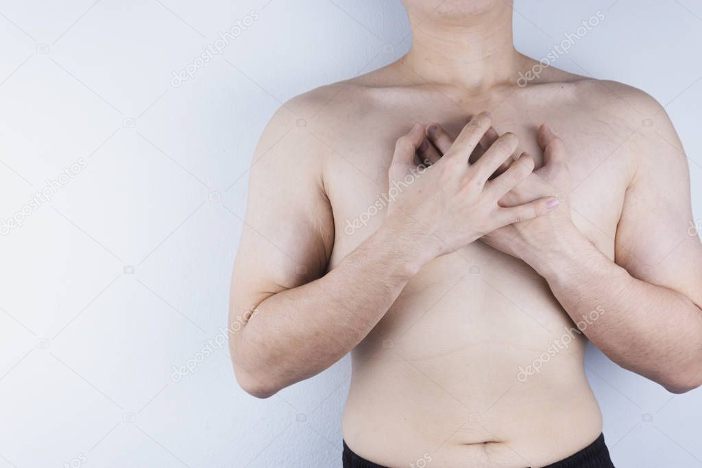 Closeup man having heart attack or chest pain. Health care and m