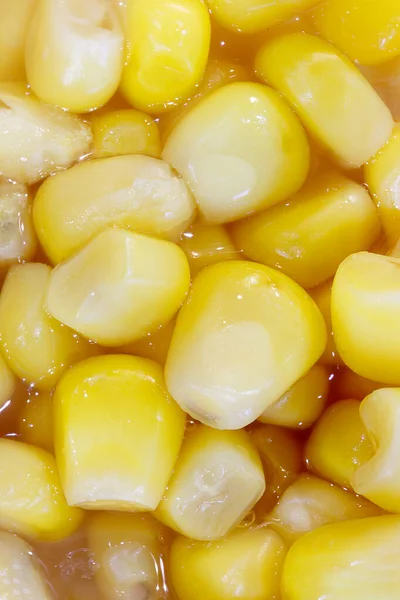 Sweet tasty canned corn in its own juice. Macro shooting.