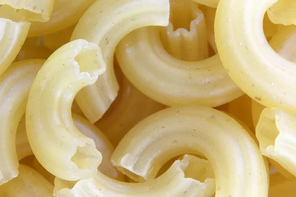 Italian pasta in a dry way close-up. — Stock Photo, Image