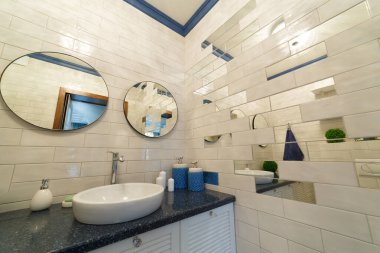Bathroom in a residential building. Dressing table with mirrors.