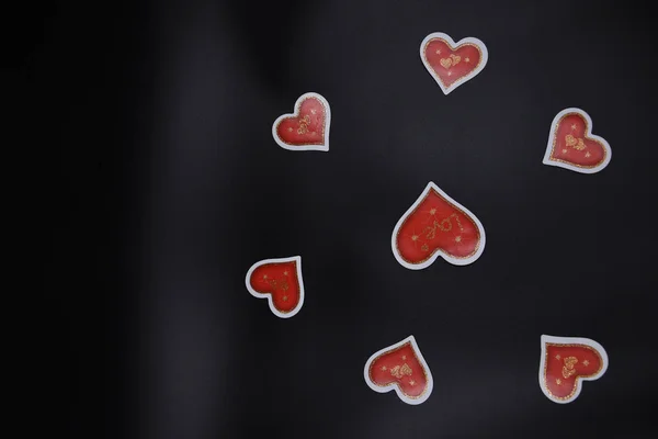 Several Red Gold Hearts Placed Black Background Several Small Hearts — Stock Photo, Image