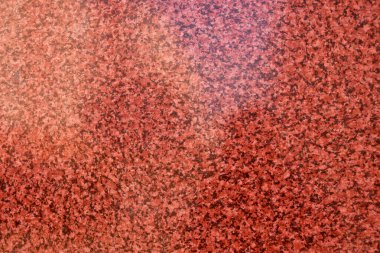 Kırmızı mermer üzerindeki gri leke, zeminin ilginç doğal rengi. Renkli mermerin arkaplanı.