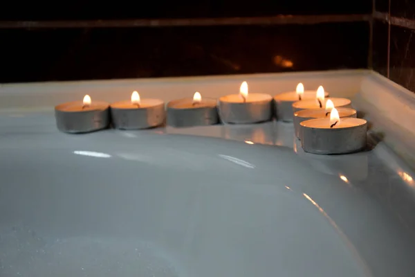 Burning Candles Liner Side Bathtub White Soapy Foam — Stock Photo, Image