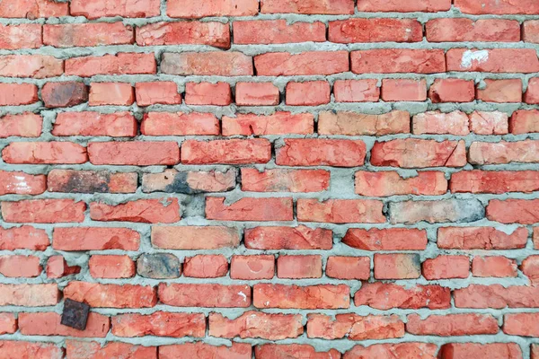 Red brick wall with cement. Background and texture — Stock Photo, Image