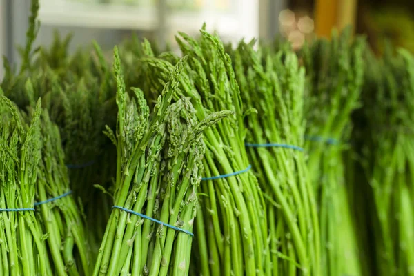 Delicious fresh asparagus bunches — Stock Photo, Image