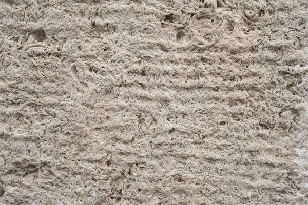 Old unpolished stone wall with grain surface, abstract background. Perfect for background — Stock Photo, Image