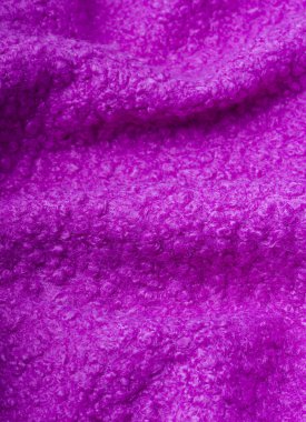 Arkaplan olarak pembe yün lifli kumaş dokusu