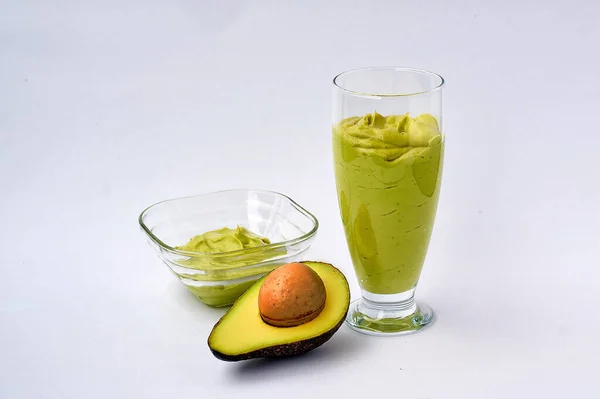 Glass Avocado Spinach Smoothies Half Avocado White Background Fitness Product Royalty Free Stock Images