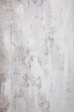 Gri renge geçiş yapan beyaz bir arkaplan. Yukarıdan bak. Olaysız yüzey.