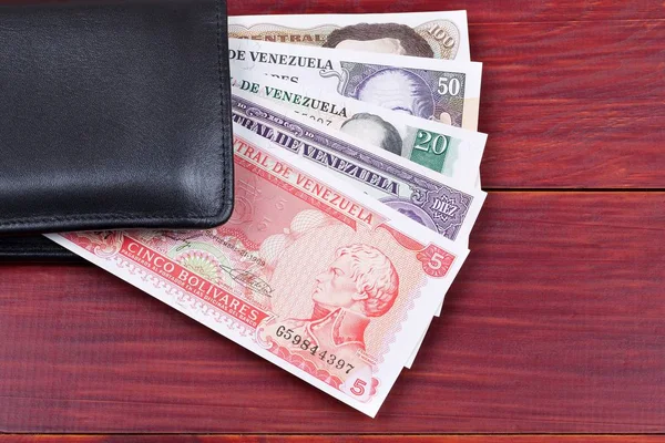 M-cüzdanda bulunan siyah eski Venezuela para 