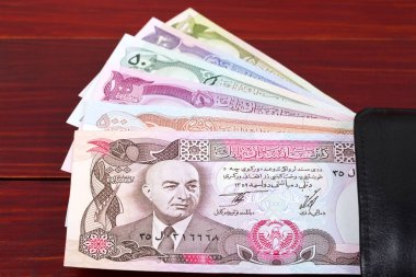 Afganistan 'dan gelen eski para. Siyah cüzdanda Afgan var.