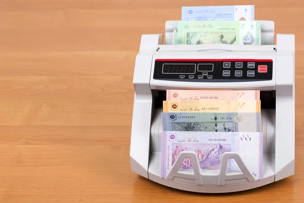 Malaysian money in a counting machine