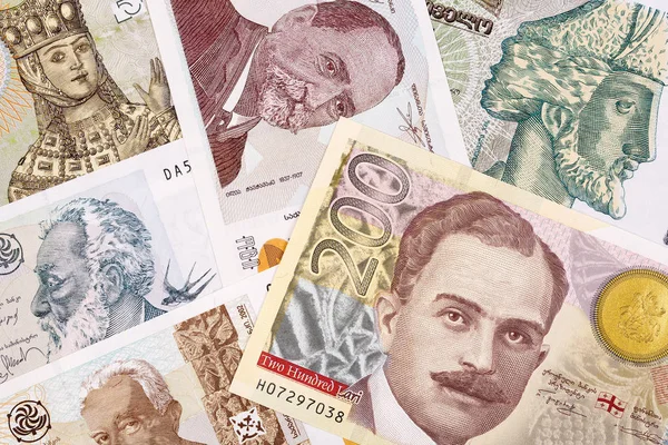 格鲁吉亚货币 拉里的商业背景 — 图库照片