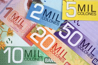 Costa Rican money - colon a business background clipart