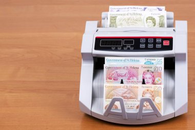 Aziz Helena Sayma makinesinde pound