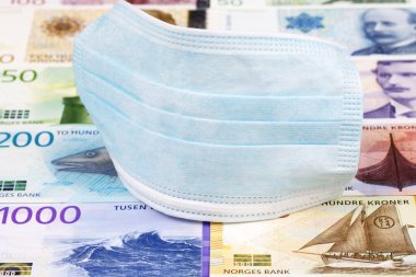 Norveç parasında koruyucu maske