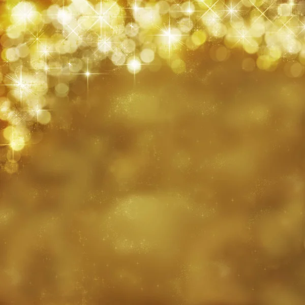 Guld festliga bakgrund. Abstrakta gyllene ljus, radiance med bokeh — Stockfoto