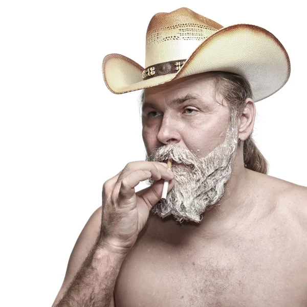 Cowboy smoking a cigar — Stock Photo, Image