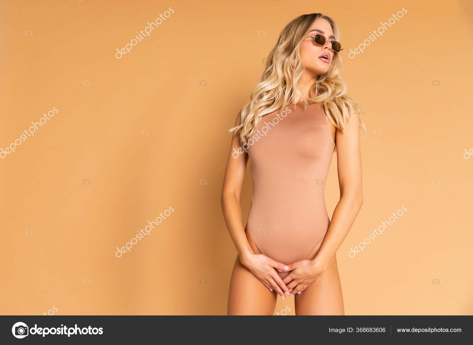 Sexy Blonde Model Perfect Skinny Body Huge Boobs Posing Beige Stock Photo  by ©evgennish 368683606