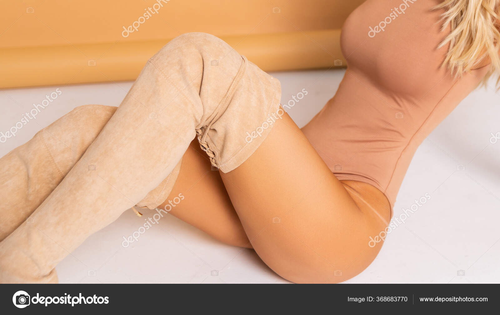 Sexy Blonde Model Perfect Skinny Body Huge Boobs Posing Beige Stock Photo  by ©evgennish 368683770