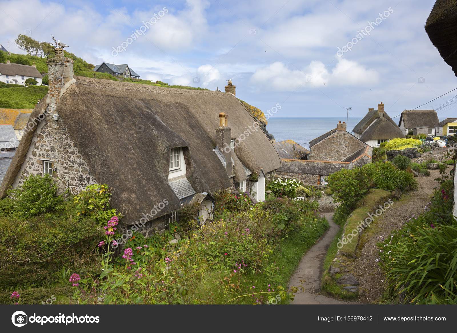 Thatched Cottages At Cadgwith Cove Cornwall England Stock