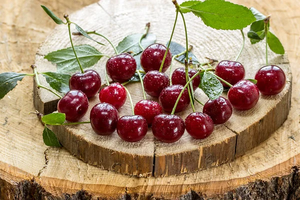 Fresh red cherry on wooden table background. — Stock Photo, Image