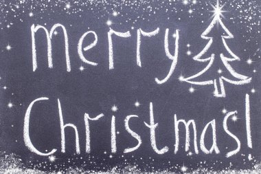 Kara tahta üzerinde yazıt Merry Christmas