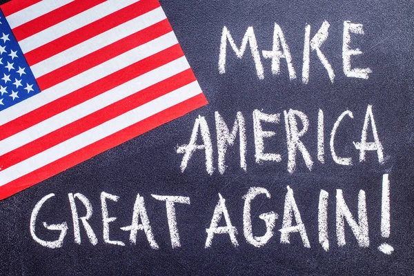 Make America great again  on the chalk board and US flag — Stock Photo, Image