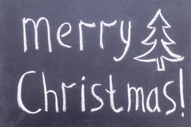 Kara tahta üzerinde yazıt Merry Christmas