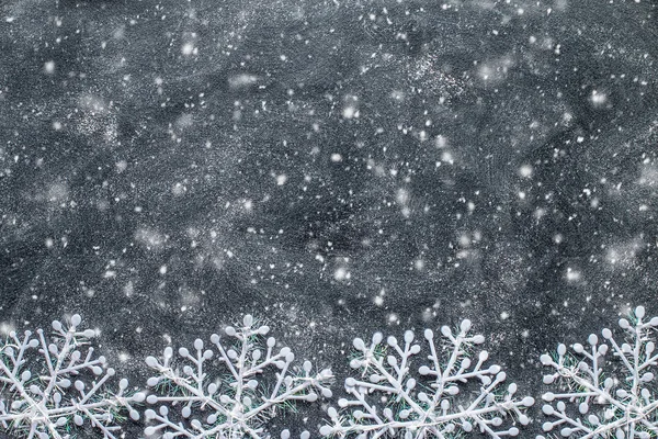 Płatki śniegu na czarnej tablicy — Zdjęcie stockowe