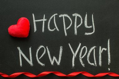 mutlu yeni yıl yazıldı tahtaya.