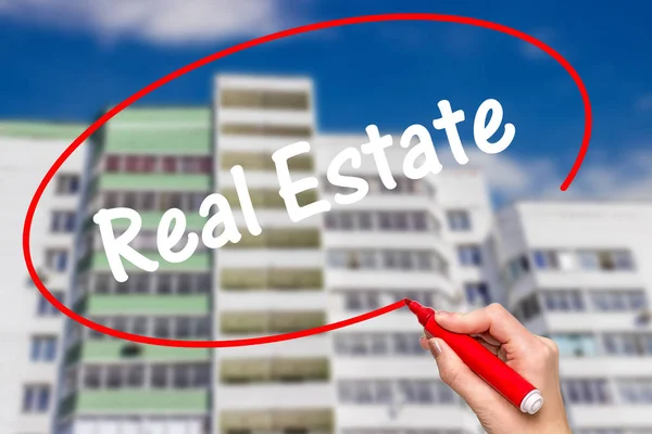 Woman Hand Writing Real Estate with red marker — Stock Photo, Image